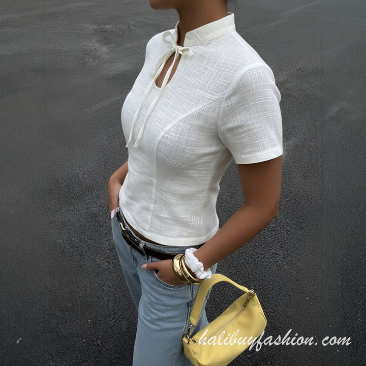 Short sleeve hollow out self tie solid textured top
