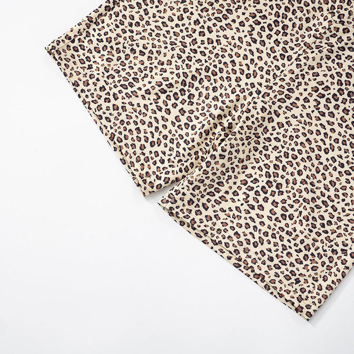 Leopard print cross back self tie backless romper