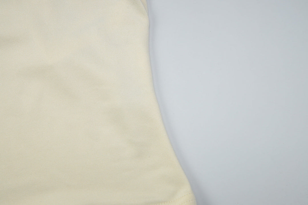 One shoulder irregular five-pointed star applique top