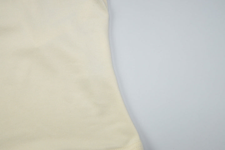 One shoulder irregular five-pointed star applique top