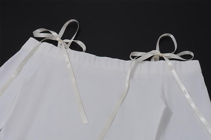 Self tie off shoulder long sleeve solid top