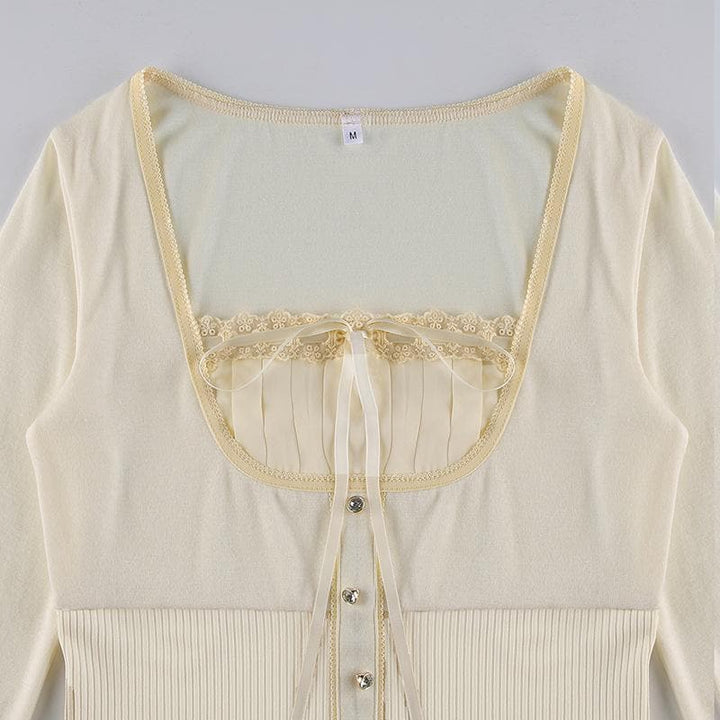 Solid long sleeve lace hem button self tie top