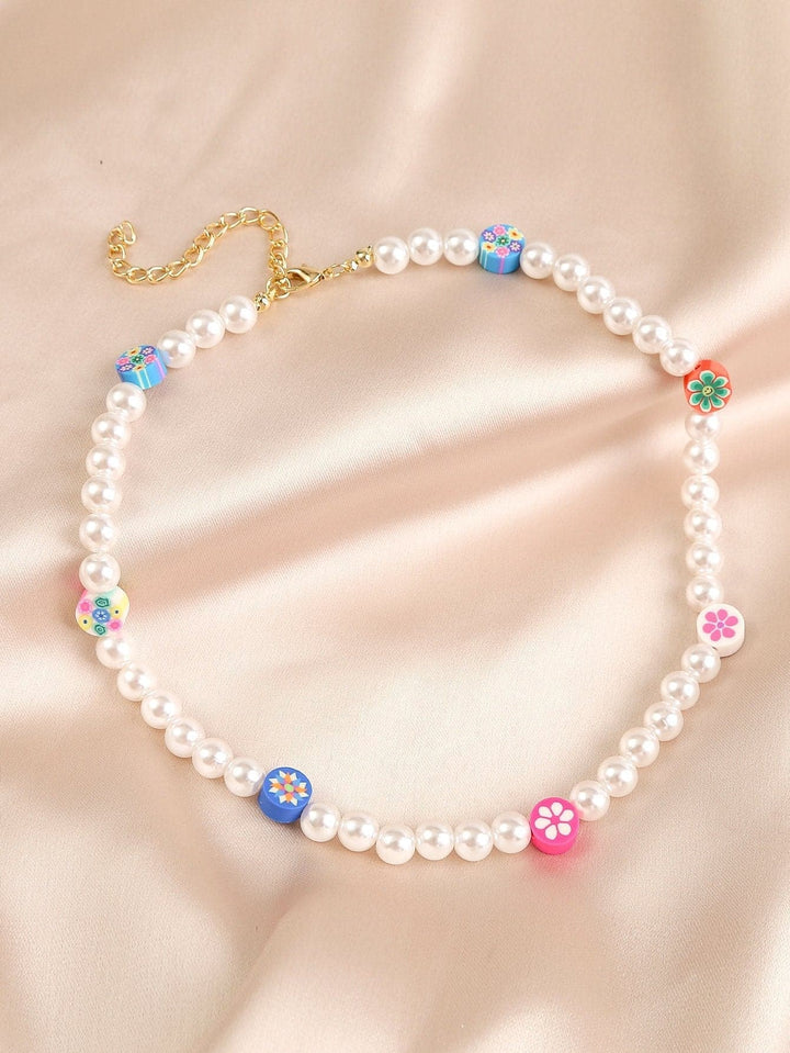 Abin wuya na lu'u-lu'u na karya na fure mai lu'u-lu'u