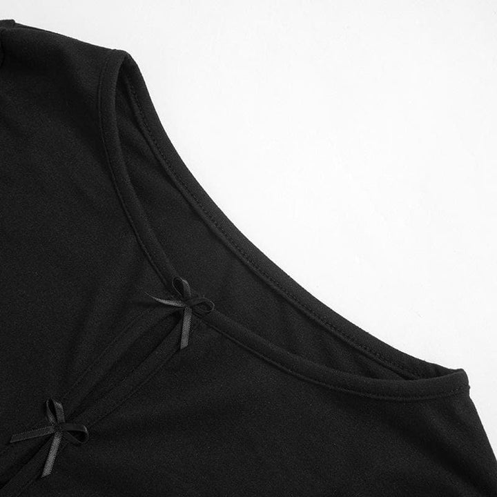 Round neck bowknot hollow out long sleeve solid cut out top