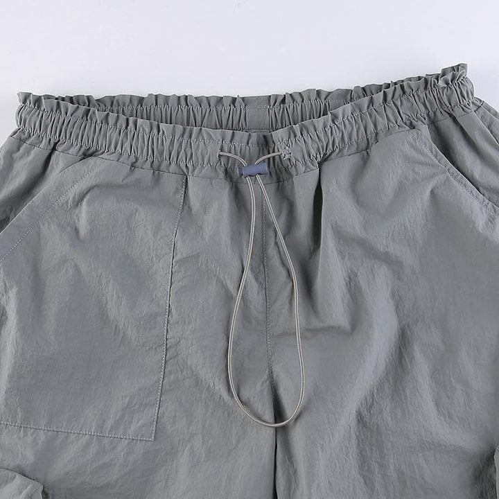 Drawstring solid cargo pocket low rise baggy pant Parachute pants