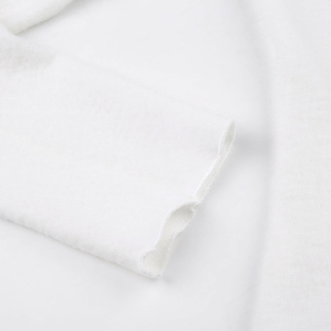 Star embroidery long sleeve ruffle round neck top- Final Sale